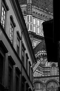 Black and white photo of the Duomo in Florence, Italy by Photographer Scott Allen Wilson taken in a hidden side street.