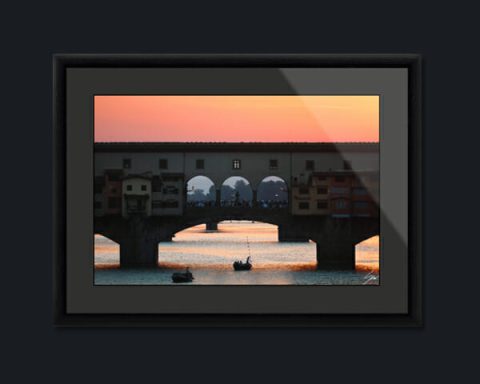 Ebony wood framed print of a sunset over Ponte Vecchio in Florence, Italy. Created by Photographer Scott Allen Wilson.
