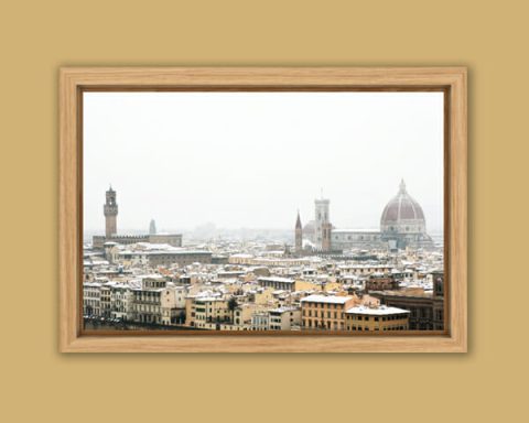 A beautiful photo of Florence, Italy with snowy rooftops taken by Photographer, Scott Allen Wilson