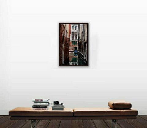 Relaxing photo of a corner in Venice, Italy, taken by Photographer Scott Allen Wilson, with a perfect mirror in the water.