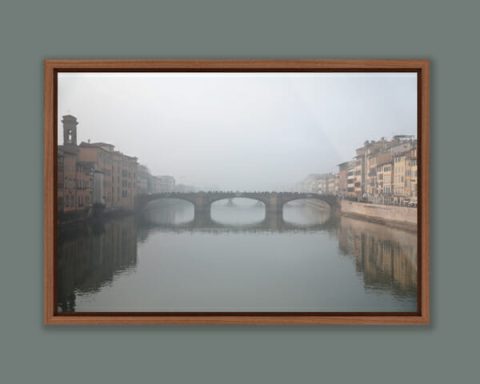 A framed print of Ponte Santa Trinita in Florence, Italy taken in the midst of a dense fog by Photographer Scott Allen Wilson.