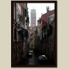 Calming framed photo of a waterway in Venice, Italy, taken by Photographer Scott Allen Wilson, with the Bell Tower of Santo Stefano standing in the background.