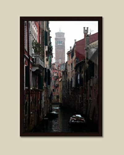 Calming framed photo of a waterway in Venice, Italy, taken by Photographer Scott Allen Wilson, with the Bell Tower of Santo Stefano standing in the background.