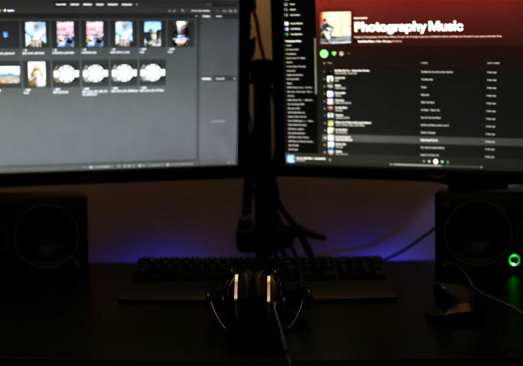 A photo of Scott Allen Wilson's desk showing his two monitors and headphones