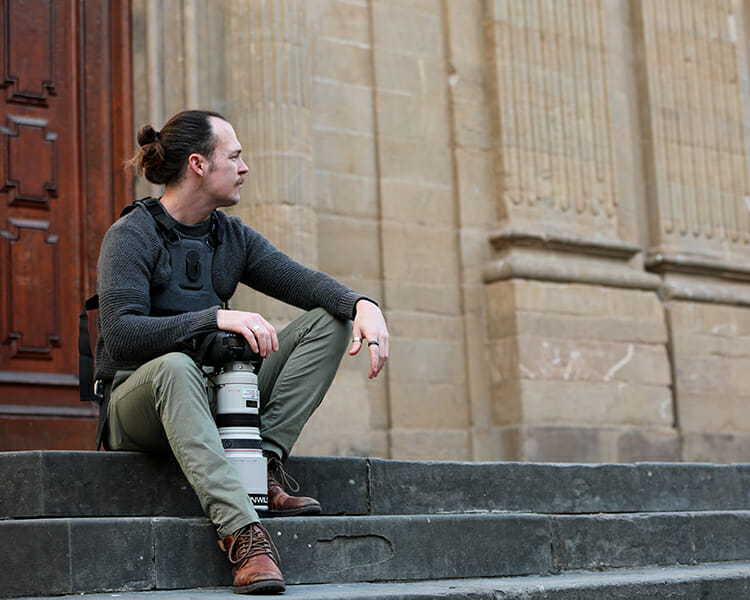 Profile portrait of Photographer Scott Allen Wilson with his camera in Florence, Italy