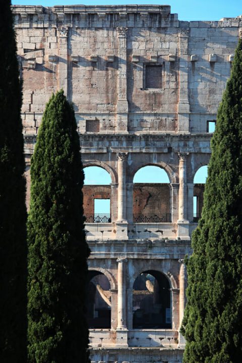 Artistic photography of the Roman Colosseum showing just a portion of its ancient architecture, taken by Photographer Scott Allen Wilson in Rome, Italy.