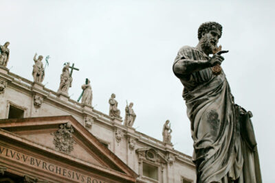 St. Peter’s Basilica with St Peter's statue in front, taken by Photographer Scott Allen Wilson in Rome, Italy