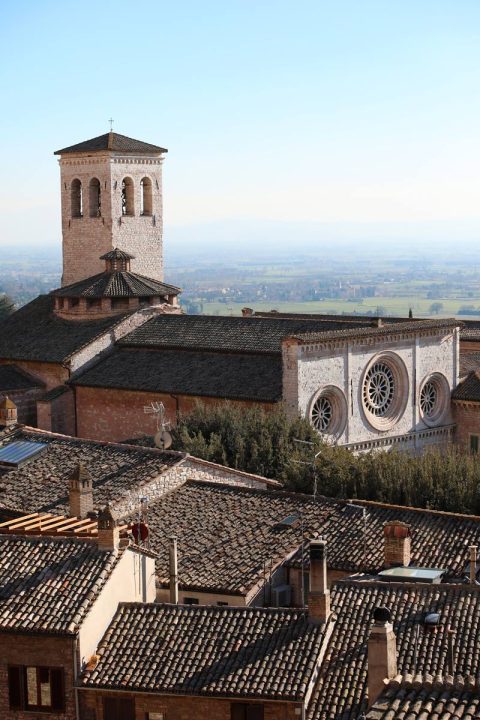 Architecture photo taken in Assisi, Italy by Photographer Scott Allen Wilson, shows the Abbey of Saint Peter from a hill.