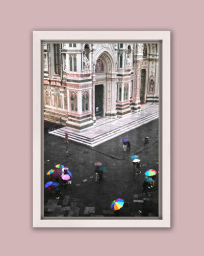 In Florence, Italy, Photographer and Digital Artist, Scott Allen Wilson, captures a view of Piazza Del Duomo with colorful umbrellas on the street.