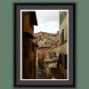 Gray framed print of the roof tops of a medieval street in Siena, Italy taken by Photographer Scott Allen Wilson
