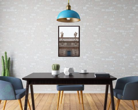 Modern dining table decoration with a framed picture behind, portraying the Palazzo Maffei in Verona, Italy taken by Photographer Scott Allen Wilson