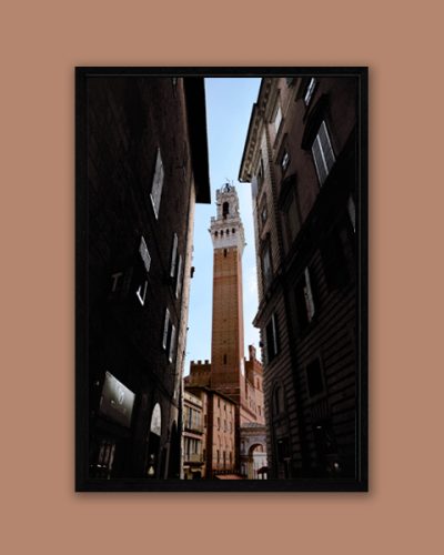 Framed print of Palazzo Pubblico framed by a narrow medieval street in Siena, Italy, taken by Photographer Scott Allen Wilson.