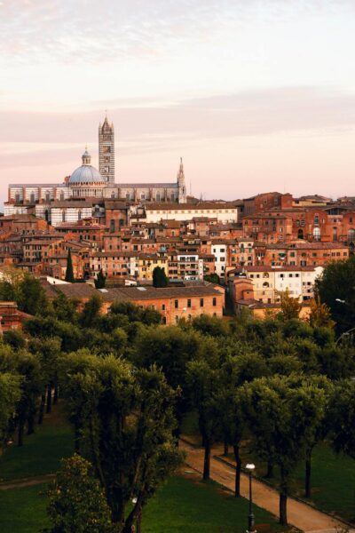 Overview of Siena, Italy taken by Photographer Scott Allen Wilson composed by warm shades that transmit a dreamy vibe.