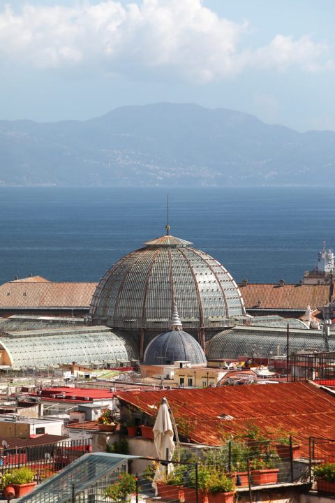 Amazing overlook of the Galleria Umberto I with water behind taken by Photographer Scott Allen Wilson in Naples, Italy.
