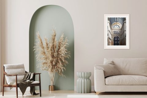 Elegant beige living room design with a framed print of Galleria Umberto I in Naples Italy, taken by Photographer Scott Allen Wilson