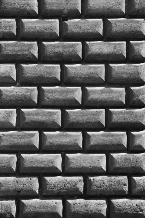 A close shot of the Palazzo Orsini brick structure taken by Photographer Scott Allen Wilson in Naples, Italy.