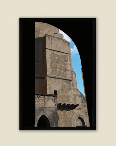 Framed print of the Santa Chiara religious complex in Naples, Italy behind an arched wall taken by Photographer Scott Allen Wilson