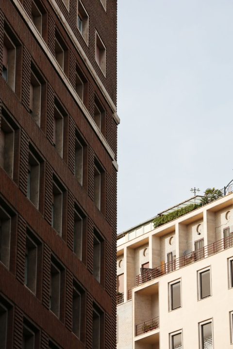 Architecture print captured by Photographer Scott Allen Wilson of a residential building framed by a narrow street in Naples, Italy.
