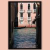 Framed print of Venice, Italy with a pink building in the background and a gondoliere coming out from the left by Photographer Scott Allen Wilson.
