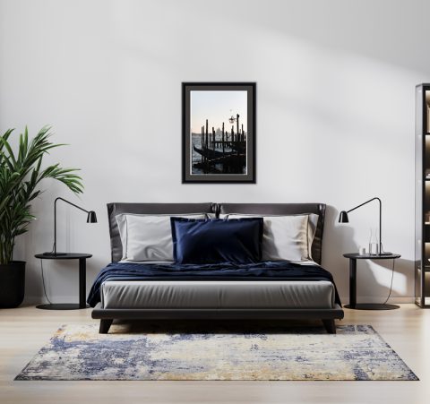 Sober modern bedroom decoration with a gray framed picture of an old dock in Venice, Italy taken by Photographer Scott Allen Wilson