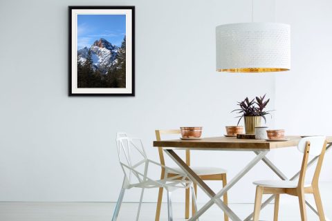 Minimalist dining room decoration with a framed print of the Dolomites, Italy by Photographer Scott Allen Wilson.