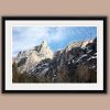 Close shot of the rocky mountain peaks in the Dolomites, Italy with pine trees at the bottom taken by Photographer Scott Allen Wilson.