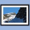 Nature framed print of two jagged peaks of the Dolomites, Italy with an intense blue sky in the background taken by Photographer Scott Allen Wilson.