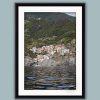Black framed symmetric shot of Manarola in Cinque Terre, Italy. By Photographer Scott Allen Wilson.