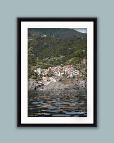Black framed symmetric shot of Manarola in Cinque Terre, Italy. By Photographer Scott Allen Wilson.