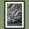 Black framed print of a rock wall in Monterosso al Mare in Cinque Terre, Italy. Shot by Photographer Scott Allen Wilson.