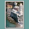 Open a window showing Cinque Terre in your home with this print by Photographer Scott Allen Wilson capturing Vernazza, Italy, from above.