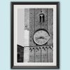 Black framed black and white print of a detail of the clock tower of Palazzo del Governatore. Captured by Scott Allen Wilson