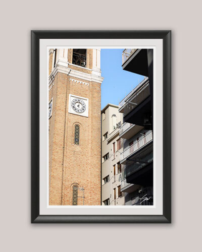 A black framed print of a clock tower in Pescara, Italy. By Photographer Scott Allen Wilson.