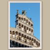 A white framed print of the Church of San Michele in Foro under the moon in the city of Lucca, Italy. By Photographer Scott Allen Wilson.