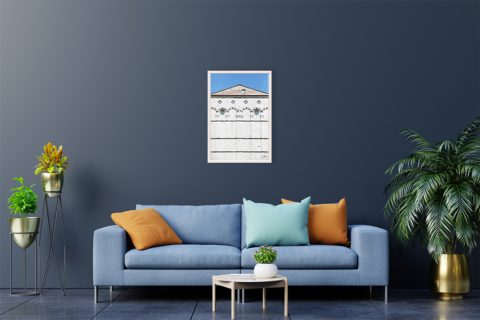 A white framed print of San Martino Cathedral in Lucca, Italy, hanging in a blue toned living modern living room. By Photographer Scott Allen Wilson.