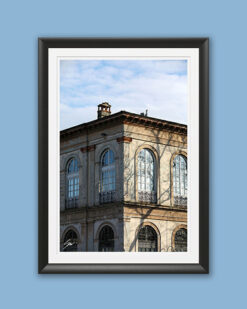 A black framed print of shadows playing on a building in the city of Lucca, Italy. By Photographer Scott Allen Wilson.