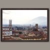 A dark brown framed print of the city of Lucca, Italy. By Photographer Scott Allen Wilson.