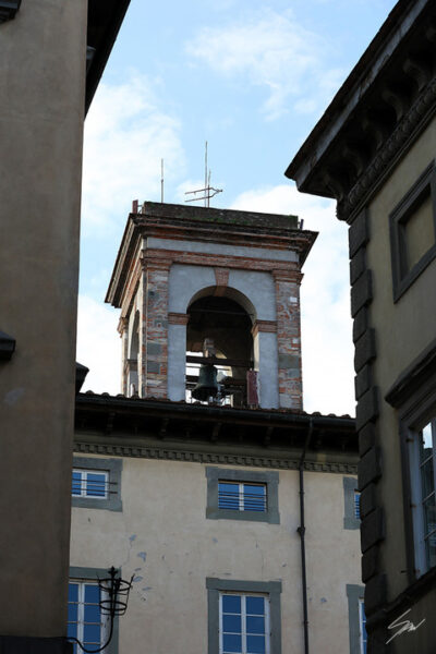 A bell tower in the city of Lucca, Italy. By Photographer Scott Allen Wilson.