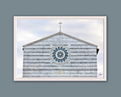 A white framed print of the façade of San Francesco Church in Lucca, Italy. By Photographer Scott Allen Wilson.
