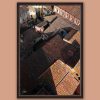 A dark brown framed print of red tiled rooftops in the city of Lucca, Italy. By Photographer Scott Allen Wilson.