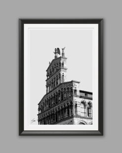 A black framed b&w print of Church of San Michele in Foro in Lucca, Italy. By Photographer Scott Allen Wilson.