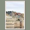 White framed artistic print of a gorgeous scenery in Genova, Italy, showcasing the vivid palette of gradient housing on a hillside. Photo captured by Travel Photographer Scott Allen Wilson.