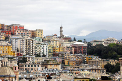 Assortment of colorful blocks rising on the side of a hill in Genova, Italy. Photo captured by Travel Photographer Scott Allen Wilson.