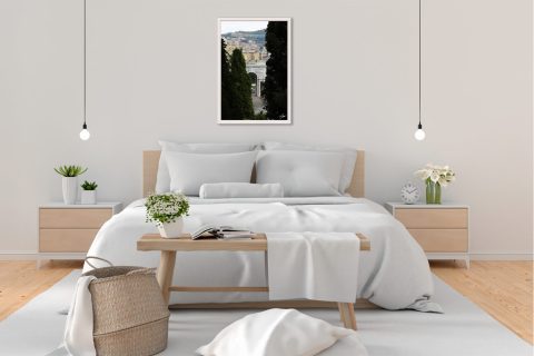 Elegant stone arch and clusters of houses surrounded by nature in Genova, Italy. Photo captured by Travel Photographer Scott Allen Wilson.