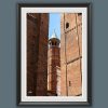 Fine art framed print of historic brick architecture against a blue sky, Ignition by Scott Allen Wilson, available in 8x12 and 16x24.
