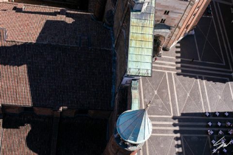 Fine art travel print of a straight-down aerial view of a historic Italian piazza with geometric paving, diagonal shadows and terracotta rooftops, Slash by Scott Allen Wilson, available in 8x12 and 16x24.