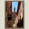 Fine art framed print of a warm Italian alley with terracotta facades framing a historic rose window and copper spire against a blue sky, Sorbet and Sunrays by Scott Allen Wilson, available in 8x12 and 16x24.