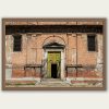 Fine art framed print of a weathered historic brick facade with a striking yellow green arched doorway, The Door Is Always Greener by Scott Allen Wilson, available in 8x12 and 16x24.