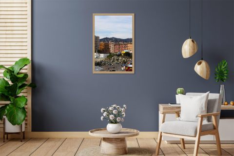 Vibrant buildings at the seaside coast a rocky beach in Genova, Italy. Photo captured by Travel Photographer Scott Allen Wilson.