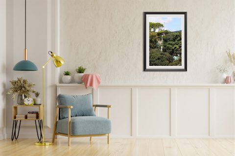 Two statues rise in the woods of Genova, Italy. Photo captured by Travel Photographer Scott Allen Wilson.